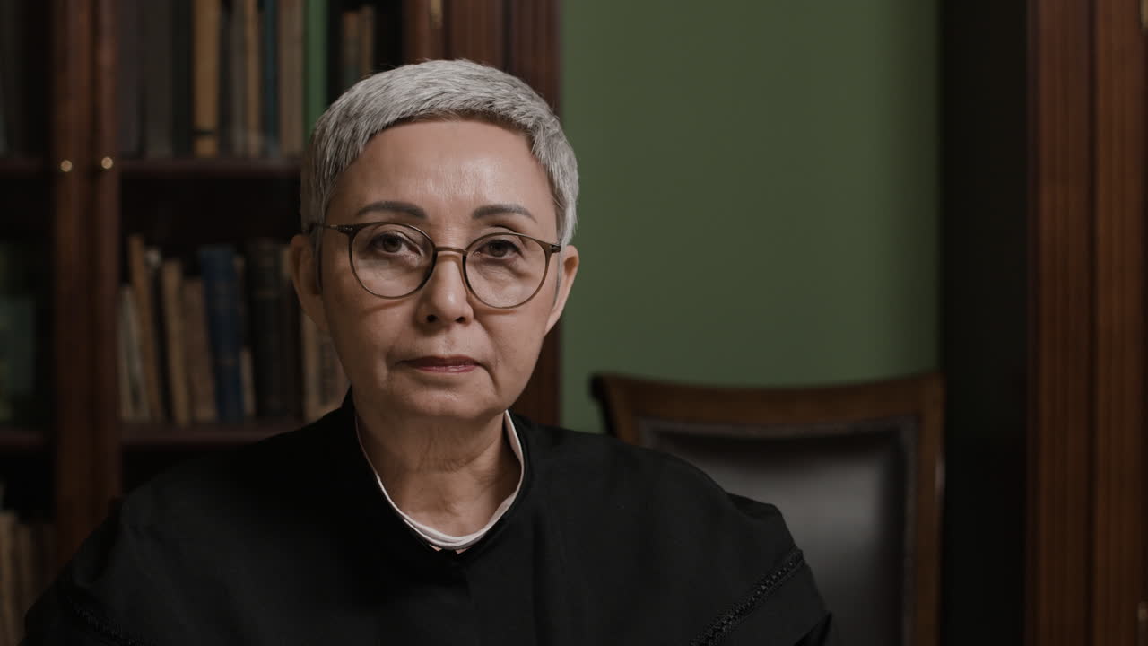 Judge reviewing documents in a court office