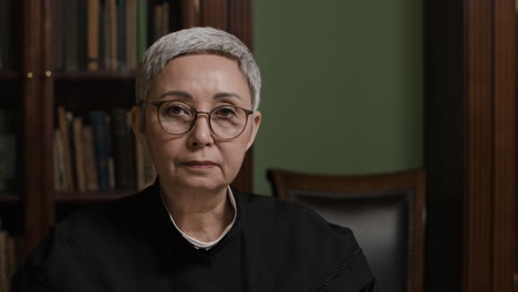 judge reviewing documents in a court office