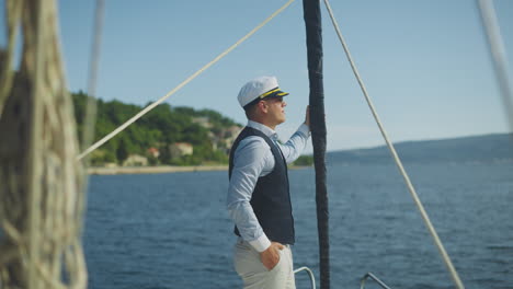 man on a yacht deck