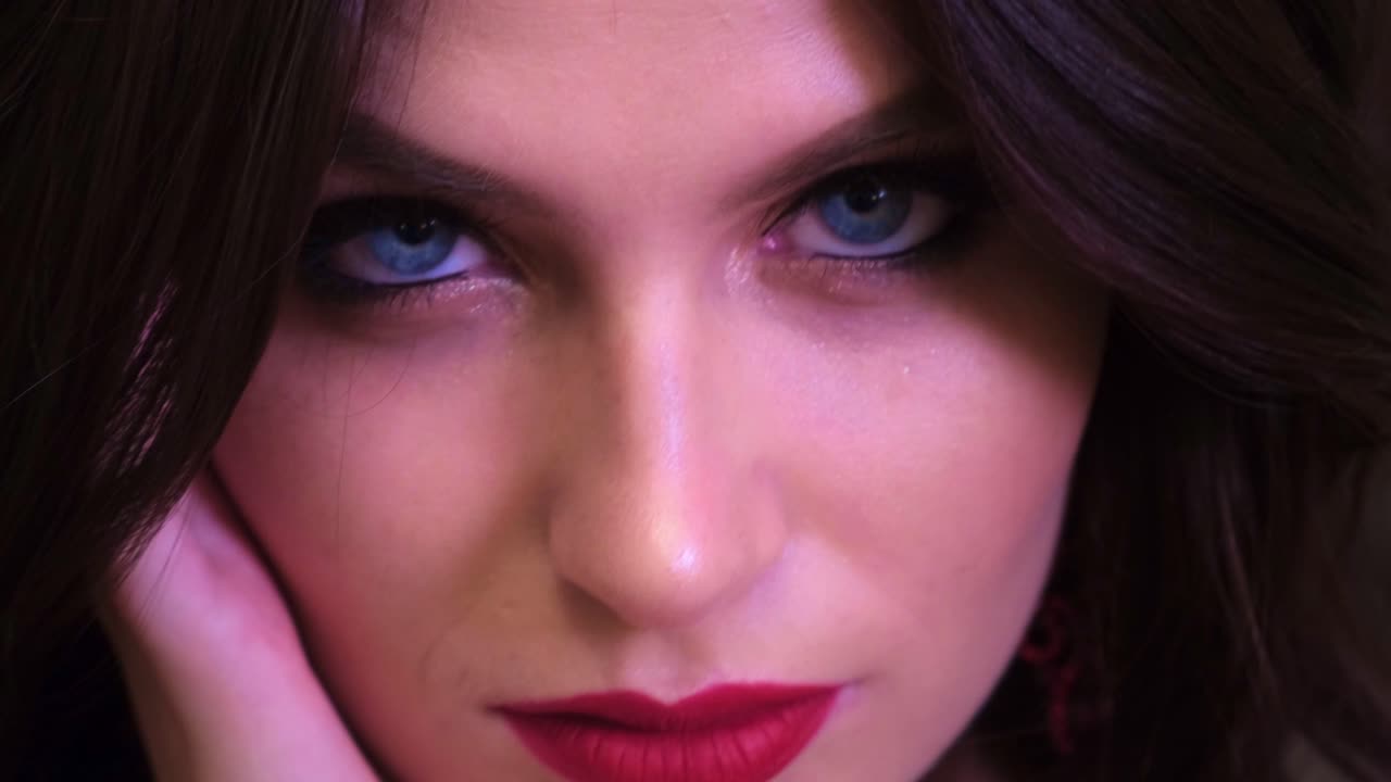 A Beauty Transformation: Captivating Moments of Glamour and Elegance in Close-Up, Showcasing Stunning Makeup and Radiant Features in Natural Lighting