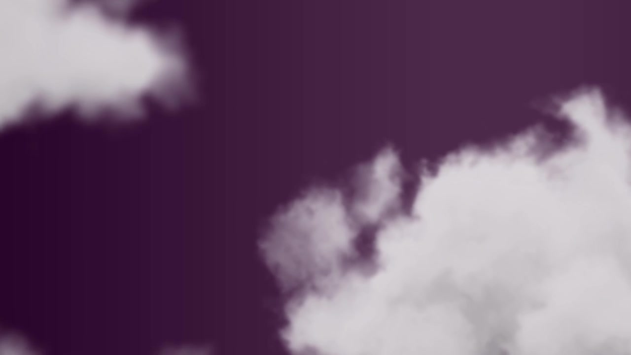 White Clouds Moving Across a Dark Purple Sky