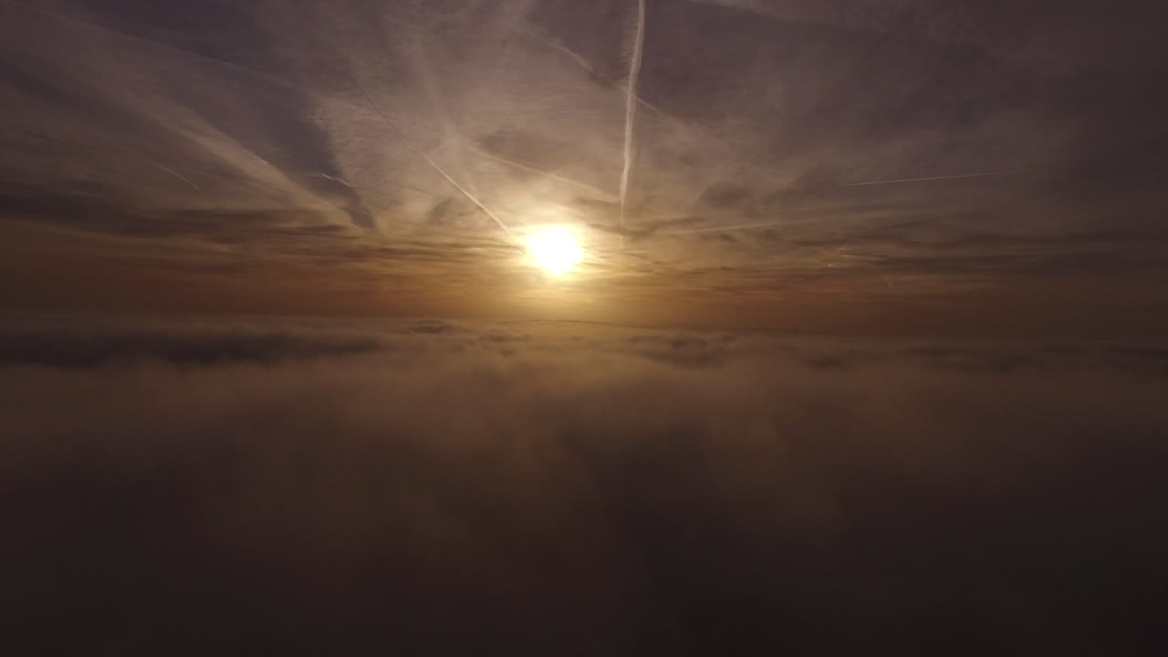Sunrise above clouds planes in sky