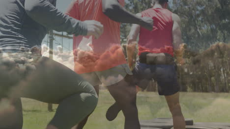 exercising on tires, people with cloud animation overlay in outdoor setting