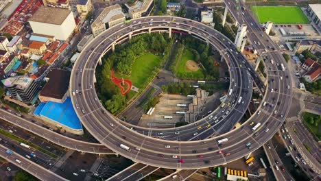 china sunset shanghai city famous traffic round road junction aerial top view 4k