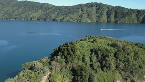 drone view of a boat in picton, new zealand