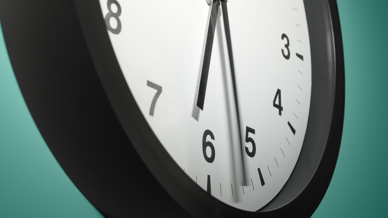 Clock Face on Cyan Blue Aquamarine Celadon Sea-Green Wall in Time Lapse