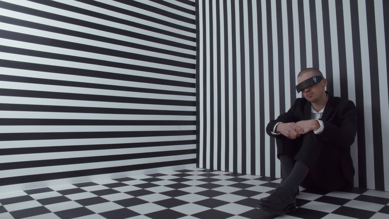 Man Wearing VR Headset in a Striped Room