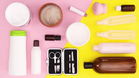 skin care spa beauty products move one by one on yellow pink theme. stop motion