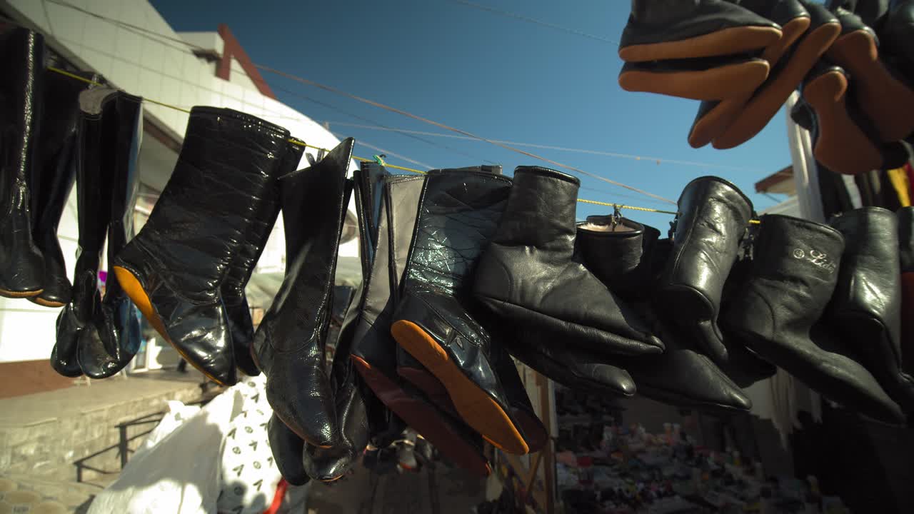 Sale of national shoes “Makhsy” at the Chorsu bazaar in the old town of Tashkent Uzbekistan Central Asia.