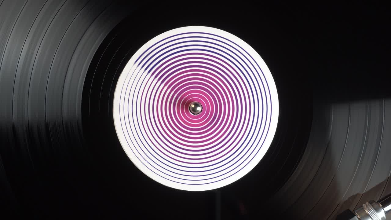 Starting Playback of Vinyl Record, Playing Music From 1980's. Top Down Close Up View