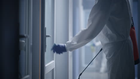 disinfecting a doorway