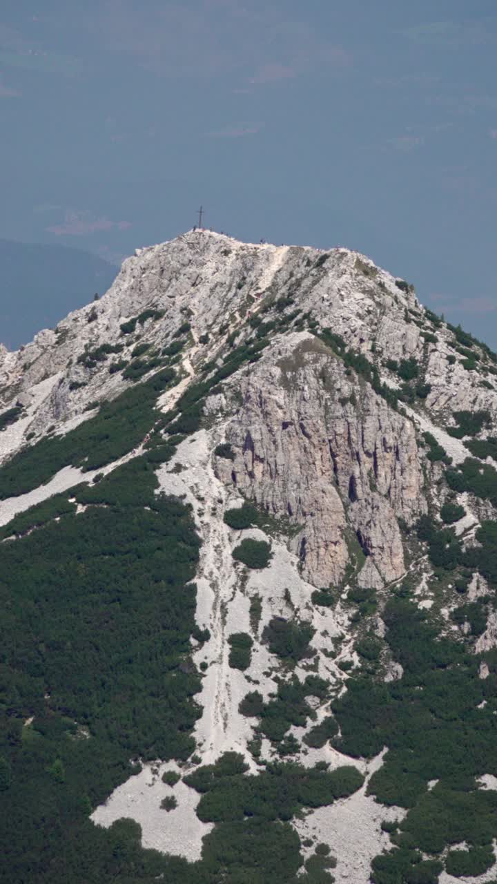 Hikers on the summit of Weisshorn - Corno Bianco in South Tyrol, Italy
