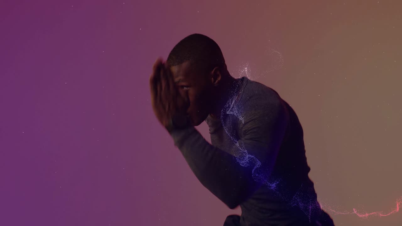 Man holding guard against gradient backdrop, practicing boxing punch and erupting violet red energy