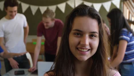 Portrait-of-teenage-girl-in-a-school-classroom