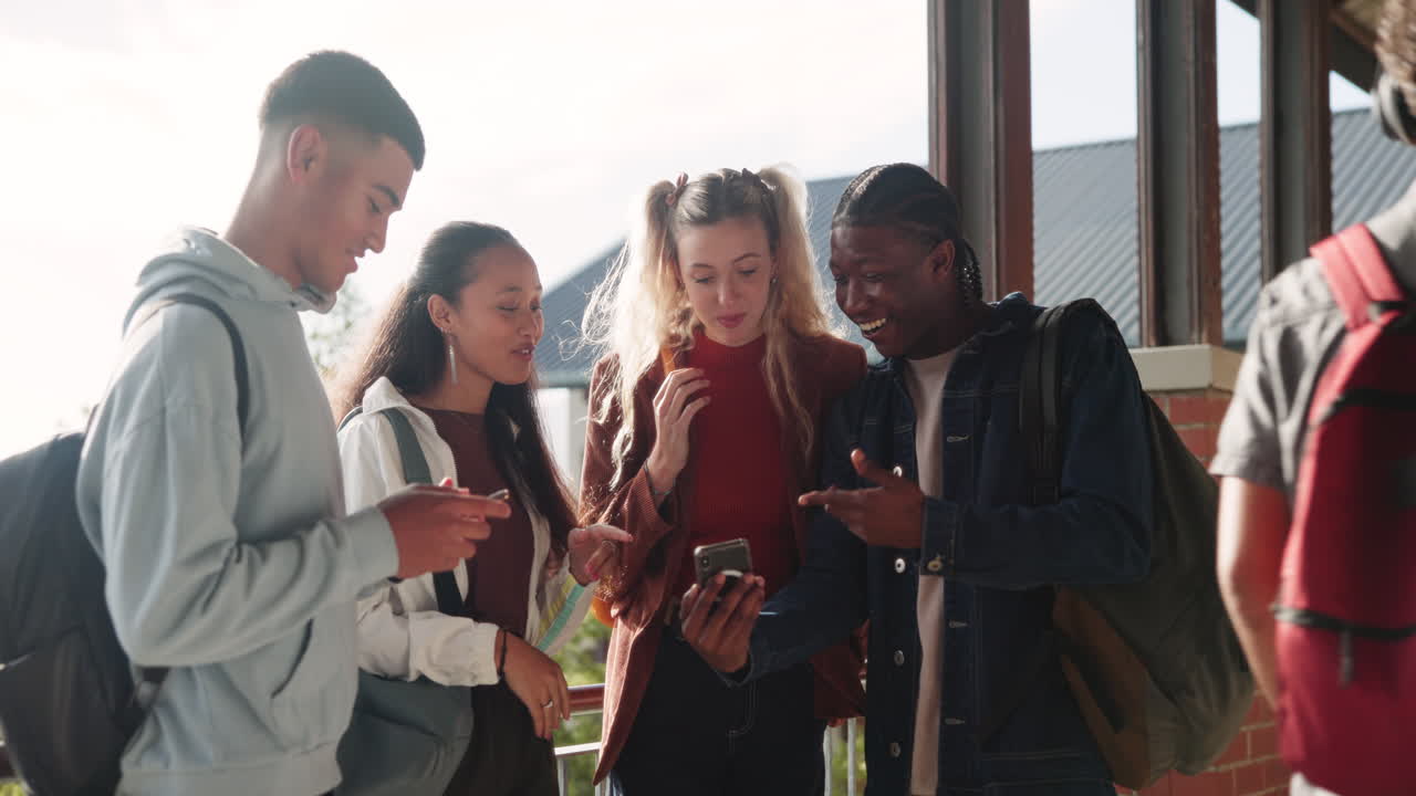 Teenagers using technology outdoors