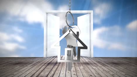 House-keys-and-key-fob-hanging-over-door-opening-in-the-background