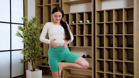 woman doing yoga indoors