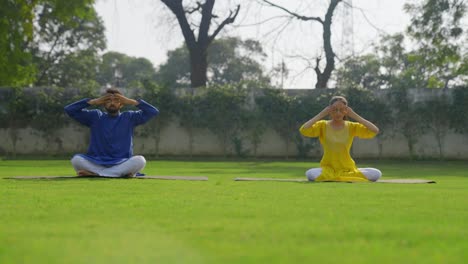 Bhramari-Pranayam-or-yoga-or-breathing-exercise-done-by-Indian-couple