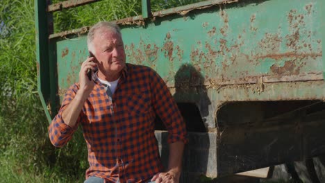 Mature-man-working-on-farm