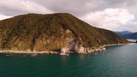 Abel-Tasman-Coast-aerial-reveal-pan-shot