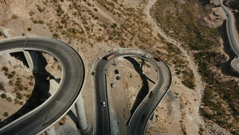 aerial over new winding cpec road at fort munro in pakistan