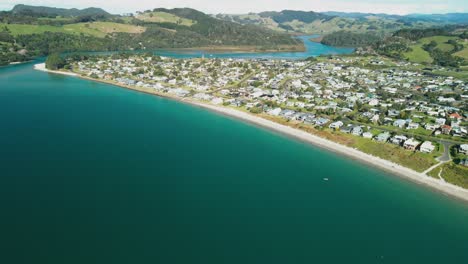 kayaking emerald green waters of cooks beach coromandel