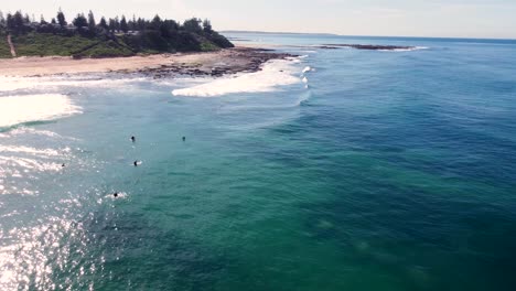 drone aerial sky view of scenic coastline with surfers on shelly beach toowoon bay central coast tourism nsw australia 3840x2160 4k