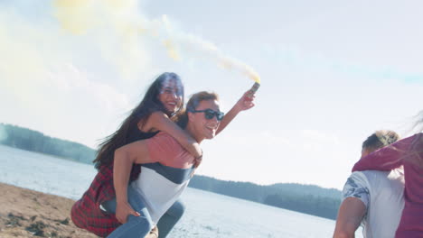 friends having fun by the lake with