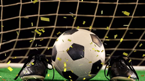 animation of gold confetti falling over soccer ball and sport shoes