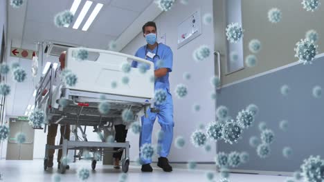 digital composite video of covid-19 cells floating against male doctor and male medical professional