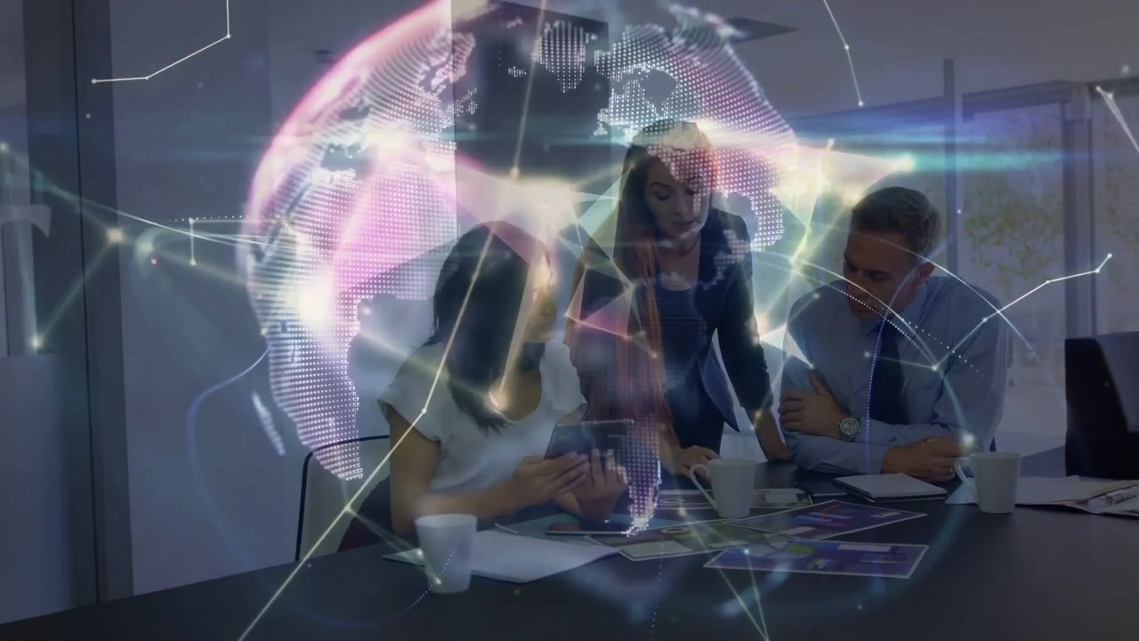Lead pointing, team tapping tablet, nodes appearing and forming into globe over table for business