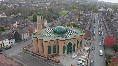 Aerial-view-of-Gilani-Noor-Mosque-in-Longton,-Stoke-on-Trent,-Staffordshire,-the-new-Mosque-being-built-for-the-growing-muslim-community-to-worship-and-congregate