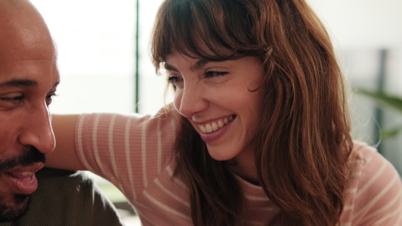 Happy Couple Laughs and Has Fun at Home