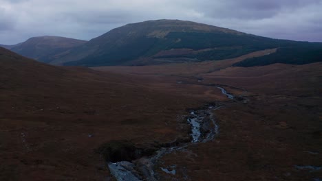 Aerial-Drone-flyover-of-Fairy-Pools-waterfalls-in-Skye-Scotland-Autumn