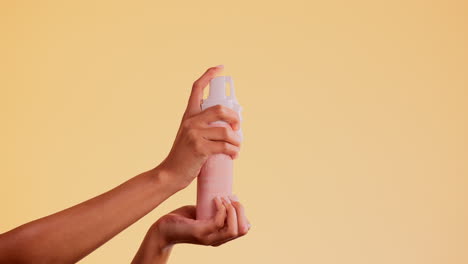 hands, soap and bottle with skincare