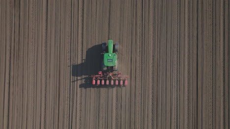 aerial view of tractor planting crops