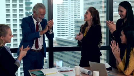 happy business people celebrate victory of success