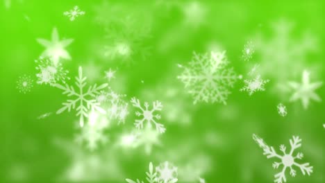 copos de nieve sobre un fondo verde