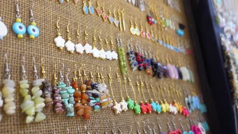 colorful handmade earrings on display