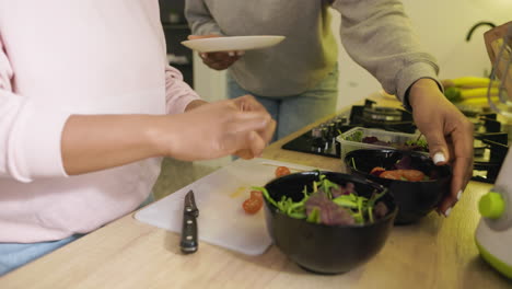 women preparing a salad