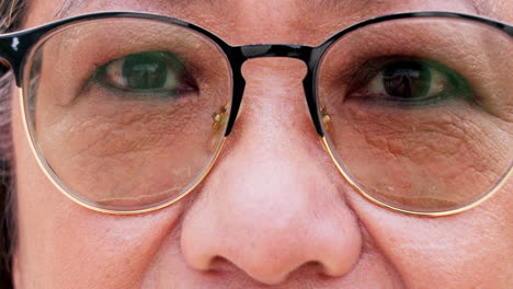 Eyes,-closeup-and-a-person-with-glasses