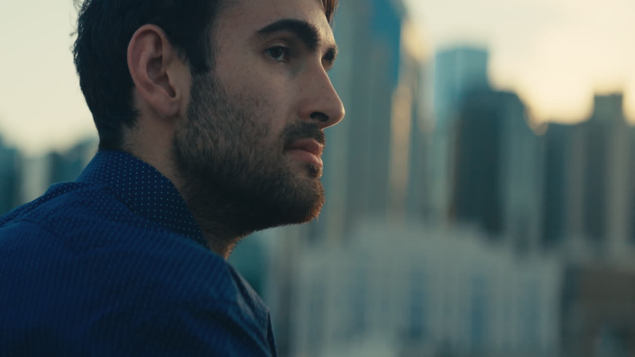 Man Looking at Cityscape