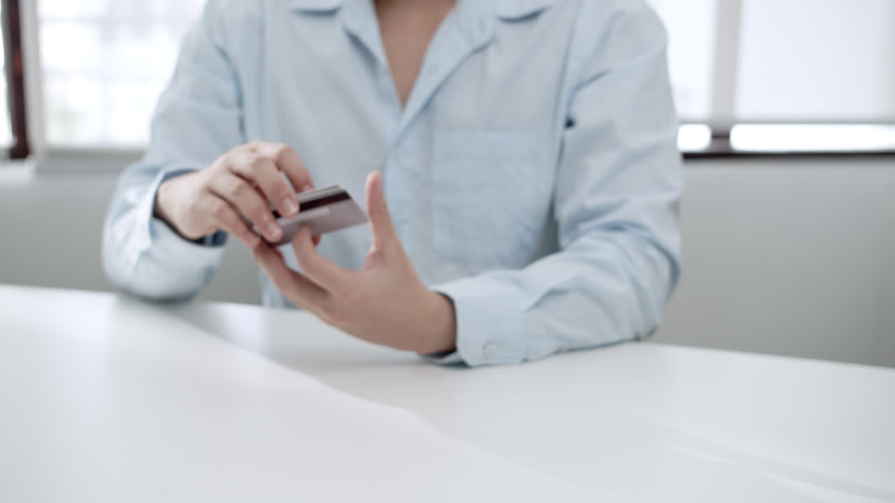 Man Making an Online Payment with Credit Card