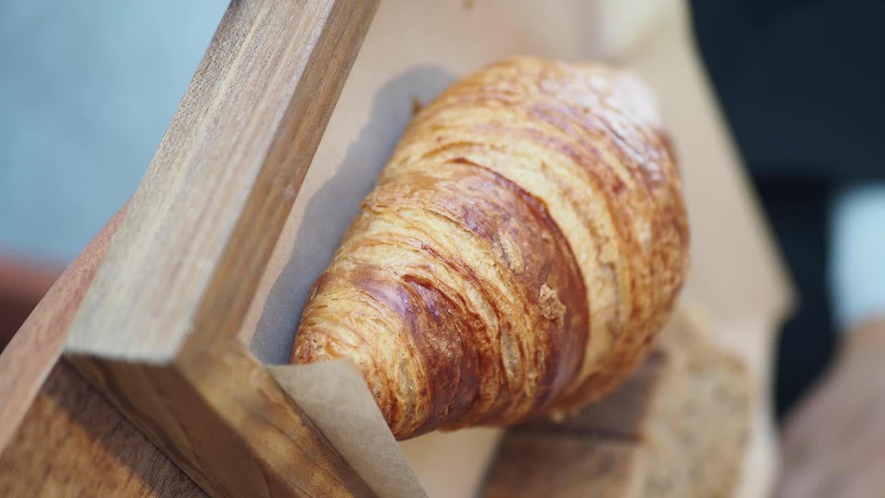 Croissant being served