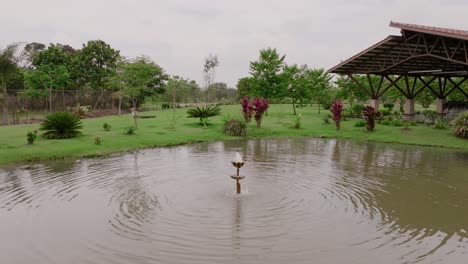 Slow-aerial-push-towards-a-gurgling-fountain