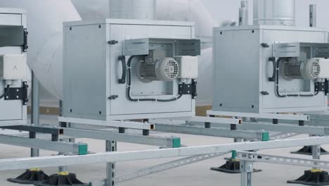 the air conditioning and ventilation system of a large industrial facility is located on the roof. it includes an air conditioner, smoke exhaust, and ventilation.