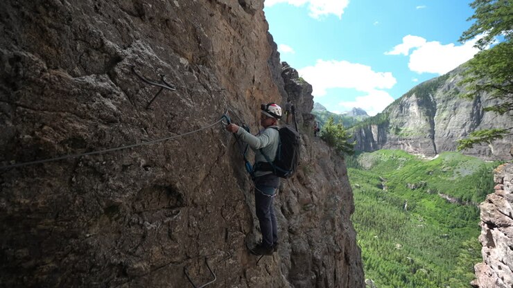 Young Man on Climbing Route in Stunning Landscape, Telluride, Colorado USA