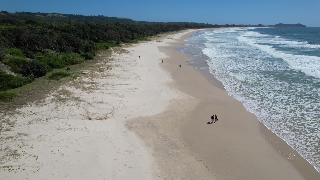 Flying Over Sandy Shore Of Broken Head Beach In New South Wales, Australia - Drone Shot