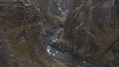 incredible fjadrargljufur canyon, iceland. aerial tilt-down