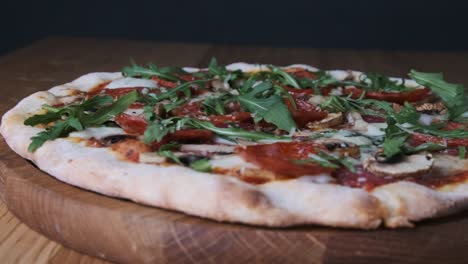 appetizing pizza on a wooden board in a restaurant